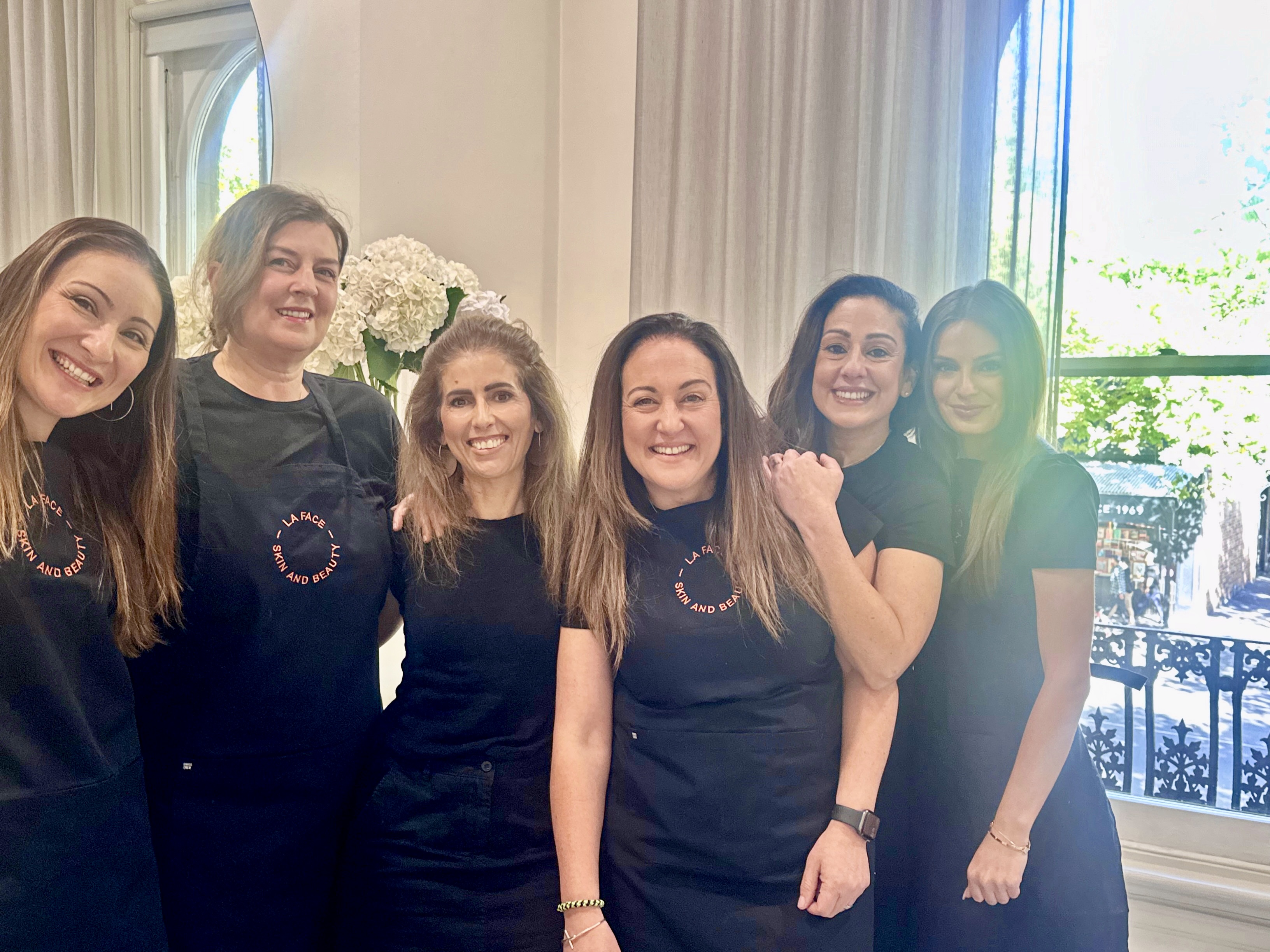 a group photo of the team members of La Facd
